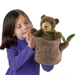 Peluche marionnette Ours dans un tronc d'arbre